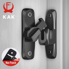 an image of a black door handle with the word kak on it and a hand holding