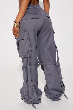 Available In Navy. Cargo Pant Low Rise Button Zipper Closure Cargo Pockets Strappy Detail Wide Leg Oversized Fit Non Stretch 65% Polyester 35% Cotton Imported | Level You Up Cargo Pant in Charcoal size Medium by Fashion Nova Gray Utility Cargo Pants Full Length, High Waist Gray Cargo Style Bottoms, Gray Mid-rise Bottoms With Belt Loops, Gray High-waist Utility Pants, Gray Utility Full-length Cargo Pants, Gray Full-length Cargo Pants, Gray High Waist Utility Bottoms, Trendy Gray Cargo Style Bottoms, High Waist Gray Utility Bottoms