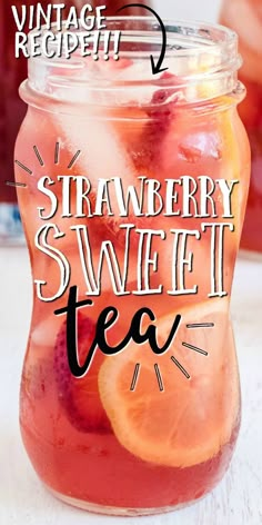 a mason jar filled with strawberry and sweet tea