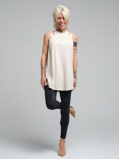 This lightweight, versatile top is a staple for any wardrobe. Crafted from a soft viscose material, it provides a comfortable, relaxed fit that's perfect for everyday wear. Its timeless design ensures it can be paired with anything from casual leggings to a tailored blazer for a smart-casual look. FEATURES:Classic, minimalist style with a modern twist. Offers a relaxed, flowing fit for all-day comfort.Easy to dress up or down for various occasions.100% Handmade. SIZE & FIT: Fit: A relaxed fit with room to moveModel is wearing size Small or S/M View our SIZE CHART before ordering MATERIALS & CARE: Content: Viscose Care: Machine wash on cold (30ºC) with a mild detergent. SHIPPING: Made to order, processing time is 15 working days This item will be shipped via DHL Camouflage Leggings, Camouflage Design, Casual Leggings, Skirt Jumpsuit, Tailored Blazer, Leggings Casual, Minimalist Style, Smart Casual, Minimalist Fashion