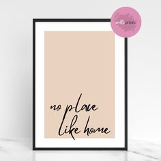 a poster with the words no place like home in black ink on a beige background