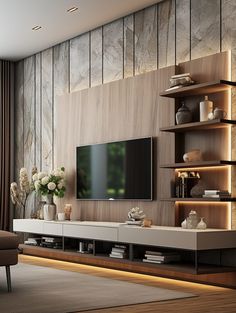 a living room with a large television on the wall and shelves in front of it