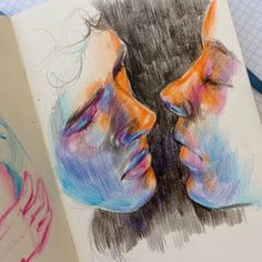 a drawing of two people's faces with colored pencils