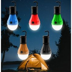 four different colored light bulbs on top of a tent