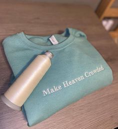 "Make Heaven Crowded" Light sage green crewneck with embroidery  Note: sizing is unisex adult. All of my items are made with care and are machine washable! Green Crew Neck Sweatshirt With Embroidered Text, Green Crew Neck Sweatshirt With Machine Embroidery, Green Crew Neck Sweatshirt With Embroidery, Crew Cotton Sweatshirt With Machine Embroidery, Cotton Crew Sweatshirt With Machine Embroidery, Crew Neck Cotton Sweatshirt With Machine Embroidery, Cotton Crew Neck Sweatshirt With Machine Embroidery, Green Crew Neck Sweatshirt With Letter Embroidery, Green Cotton Sweatshirt With Letter Embroidery