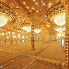 an elaborately decorated room with chandeliers and lights