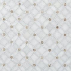 a white and gold wallpaper with circles on the back ground in an abstract pattern