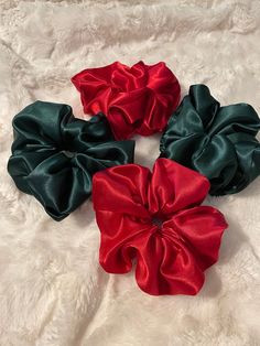 Satin SUPER SOFT silky Xmas scrunchie  This handmade holiday scrunchie is soft and doesn't pull on your hair! Comes in Red and Green and sized regular and large!  Regular = 3.5 inches across  Large = 5 inches across  contact me for questions about sizing and colors. Handmade Holiday, Green Satin, Stocking Stuffer, Hair Ties, Scrunchies, Red Green, Satin, Green, Hair