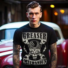 Hand-drawn Greaser Mechanics Rockabilly design printed onto a premium quality Men's T-Shirt. All my products are designed and printed with love and passion and are custom made for you! The Greaser Mechanics Men's T-Shirt is available in Black and in sizes S, M, L, XL, 2XL, 3XL, 4XL, 5XL, 6XL. If you need a different color or a polycotton mix, please do not hesitate to contact me. I'm here to help. This items has a normal fit. Important: Please double-check the Men's T-Shirt size chart in the image gallery before placing your order. This item is custom printed for each customer after the order is placed. This cotton tee should be a staple of everyone's wardrobe. The pre-shrunk cotton makes for durable wear and a form-fit that won't stretch after a few washes. - 100% pre-shrunk cotton - Fabr Retro Graphic Print T-shirt For Biker Events, Casual T-shirt With Custom Print For Biker Events, Rockabilly Graphic Print Short Sleeve Top, Punk Style Custom Print Short Sleeve T-shirt, Punk Style Custom Print T-shirt For Streetwear, Punk Style Crew Neck T-shirt For Biker Events, Punk Style Short Sleeve T-shirt For Biker Events, Rockabilly Style Men, Rockabilly T Shirt