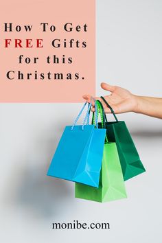 a hand holding shopping bags with the text how to get free gifts for this christmas