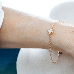 This Christian bracelet features a sterling silver cross and heart linked design, making it a perfect gift for her. This dainty bracelet, also available as a gold-filled bracelet, is an ideal gift for your daughter or granddaughter.  Discount for set of two. Focuses on the "More to Come".  His sacrifice was the beginning, the tomb is the sign of hope and the return of Christ is the promise.  The Sterling Silver Forever More Cross is attached to the Sterling Silver Linked-Heart Bracelet with a Pi Adjustable Chain Cross Rosary Bracelet As Gift, Rosary Bracelet With Cross And Adjustable Chain For Gifts, Adjustable Cross Rosary Bracelet As Gift, Nickel-free Cross Bracelet Gift, Nickel-free Rosary Bracelet As Gift, Christian Bracelets, Dainty Bracelets, Sterling Silver Cross, Heart Bracelet