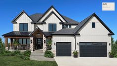 a large white house with black garage doors