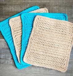 three crocheted placemats sitting on top of a wooden table next to each other