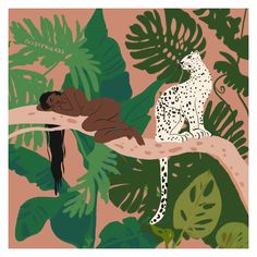 a woman laying on top of a tree branch next to a white cheetah