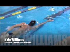 a man swimming in a pool with his arm extended