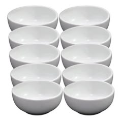 six white bowls are stacked on top of each other