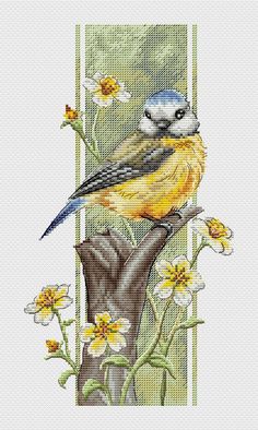 a cross stitch bird sitting on top of a tree branch with daisies in the background