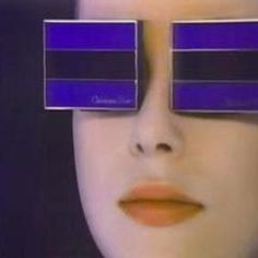 a woman's face with two blue rectangles over her eyes