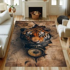 a living room area rug with a tiger on it's face and compass in the middle