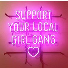 a neon sign that says support your local girl gang