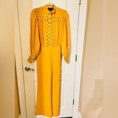 The Sang Mustard Color Jumpsuit. Size Medium. Sheer Top. Stretch Crepe Fabric At The Bottom. Side Invisible Zipper. Invisible Zipper At Sleeves. Xtra Buttons Attached. Nwt Elegant Yellow Jumpsuits And Rompers For Work, Elegant Yellow Jumpsuits For Workwear, Elegant Yellow Long Sleeve Jumpsuit/romper, Elegant Yellow Long Sleeve Jumpsuit, Colorful Jumpsuit, Mustard Color, Stretch Crepe, Sheer Top, Crepe Fabric