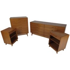 four pieces of furniture are arranged in the shape of a chest and two end tables