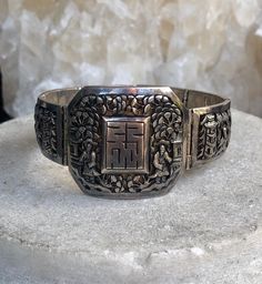 Circa 1920s Beautiful Old Chinese Shou Village Scene Tempel Sterling Silver Vintage Antique Braclet Face measures over 1 1/2 wide by 1 1/2 inches tall Antique Cuff Bracelet For Formal Occasions, Victorian Engraved Cuff Bracelet For Ceremonial Occasion, Vintage Rectangular Bracelet Strap Jewelry, Antique Rectangular Ceremonial Jewelry, Antique Engraved Ceremonial Bracelets, Antique Carved Bracelets, Vintage Carved Bracelets For Ceremonial Occasions, Antique Hallmarked Cuff Bracelet For Ceremonial Use, Antique Engraved Bracelets For Ceremonial Occasions