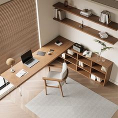 an overhead view of a home office with desk, chair and bookshelf on the wall