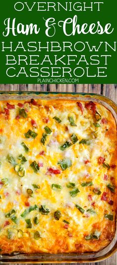 a casserole dish with cheese and vegetables in it on a wooden table next to a green napkin