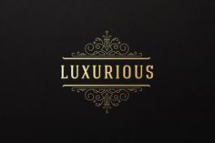 the luxurious logo for luxury boutiques is shown in gold and black colors on a dark background