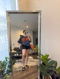 Casual summer outfit idea for edgy girls! Featuring a new band tee from Urban Outfitters. I’m wearing a L/XL tee, size 31 shorts and size 9 sandals #LTKstyletip #LTKunder100 #LTKSeasonal