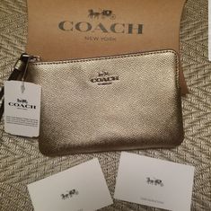 Cute Never Used Authentic Coach Wristlet With Tags Elegant Gold Coach Wristlet, Classic Rectangular Wristlet Perfect As A Gift, Classic Rectangular Wristlet For Gift, Classic Rectangular Wristlet As Gift, Silver Wristlet For Evening, Gold Rectangular Wristlet For Gifts, Elegant Silver Rectangular Wristlet, Coach Elegant Wristlet Gift, Coach Gold Clutch Wristlet