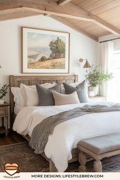 a large bed sitting under a painting in a bedroom