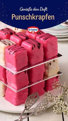 pink and white desserts stacked on top of each other