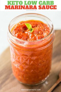 keto low carb marinara sauce in a glass jar on a cutting board