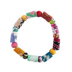 Colorful, round and tubular kantha beads create this unique, geometric style - perfect for single wear or for layering and stacking. Crafted from recycled Kantha textiles; colors & patterns will vary. Beads measure 0.25″ wide and bracelet stretches to fit most. Sustainably handmade by women artisans in India. Casual Multicolor Fair Trade Bracelets, Everyday Multicolor Wooden Beaded Bracelets, Everyday Multicolor Wooden Beads Bracelet, Multicolor Bohemian Beaded Bracelet For Festive Occasions, Multicolor Bohemian Beaded Bracelets For Festive Occasions, Bohemian Multicolor Fair Trade Beaded Bracelets, Multicolor Bohemian Beaded Bracelets Fair Trade, Casual Multicolor Fair Trade Jewelry, Unique Multicolor Beaded Bracelets For Everyday