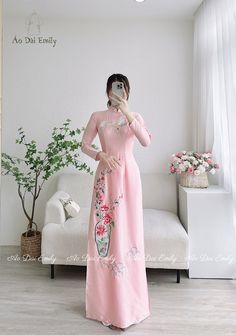 🌻Material: Lụa vân gỗ 🌻Stretchy level: 2/10 🌻 The measurement of this ao dai (long dress) is in Vietnamese size (American size tends to be bigger for the same size). Please LOOK AT THE SIZE CHART CAREFULLY BEFORE ORDERING. There might have some chalk writings on the fabric due to making process. These marks can be washed away easily. 🌻🌻No returns or exchanges Buyer can contact seller about any issues with an order. 🌸 Follow us Facebook/aodaiemily www.aodaiemily.com 💜 Thank you very much💜 Elegant Pink Ao Dai With Floral Embroidery, Pink Ao Dai With Floral Embroidery For Wedding, Wedding Ao Dai In Pink With Floral Embroidery, Wedding Ao Dai With Pink Floral Embroidery, Wedding Pink Ao Dai With Floral Embroidery, Elegant Long Sleeve Cheongsam With Floral Embroidery, Elegant Ao Dai With Floral Embroidery For Festive Season, Spring Wedding Embroidered Ao Dai, Spring Wedding Embroidered Cheongsam