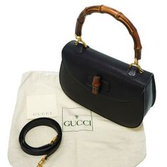 Gucci bamboo leather shoulder hand bag black with strapBrand: GucciGender: WomenCountry of Origin: ItalyHardware color: GoldMaterial: LeatherComes with: Shoulder strapSize (HxWxD): 18cm x 26cm x 8.5cm / 7.08'' x 10.23'' x 3.34'' Black Bamboo, Gucci Model, Italy Design, Gucci Bamboo, Gucci Models, Gucci Handbags, Bags Designer Fashion, Exclusive Bag, Leather Accessories