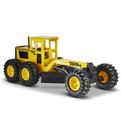 a toy tractor with large tires on white background