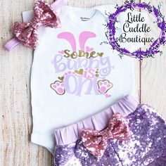 "This is an adorable Easter birthday outfit. This outfit features a bodysuit with the words \"Some Bunny Is Turning One\". The outfit is complete with a matching lavender headband and shorts. Other bottoms/headbands are available in my shop as well to choose from. HOW TO ORDER: 1.Bodysuit-Select Style and Size from the drop down and add to cart (S/S=Short Sleeve, L/S=Long Sleeve). 2.Add bottom and headband to complete the outfit for best value (optional). 3.Complete purchase and Enjoy. All order Pink Onesie For Birthday In Spring, Pink Fitted Onesie For Birthday, Fun Birthday Sets For Spring, Cute Fitted Bodysuit For Birthday, Birthday Fitted Letter Print Bodysuit, Playful Fitted Onesie For Birthday, Cute Spring Party Bodysuit, Cute Fitted Easter Sets, White Sets With Letter Print For Birthday