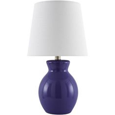 a blue lamp with a white shade on it