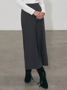 Editor's NotesInverted Banding Long Skirt is bendable long skirt highlighting a trendy silhouette. Mixed polyester and span material that comfortable and stretchable skirt.- Relaxed fit with front pleat details- Back banding comfortable wearable- Items that can be matched with various tops on a daily basisMeasurements(in.)Size: One size- Waist: 12.2 in. - Hip: 18.9 in.  - Hem: 24.4 in. - Length: 35 in. *Model info: Height 5ft 7. / Bust: 31.5 in. / Waist: 22.8 in. / Hip: 34.6 in. Composition & Care- 95% POLYESTER 5% SPAN- Please check the care label- High density cotton 100% material with high density and solid weight.- Bio-washing processing soft and pleasant wearability and minimizing reduction.- Premium fabric with good organization and durability.- Depending on the monitor color and Flared Lined Skirt With 4-way Stretch, 4-way Stretch Flared Lined Skirt, Versatile Stretch Asymmetrical Skirt, Stretch Asymmetrical Skirt, Versatile Long Skirt With Lined Detail, Chic Long Skirt With 4-way Stretch, Elegant Lined Skirt With 4-way Stretch, Versatile Full Length Lined Skirt, Versatile Full-length Lined Skirt