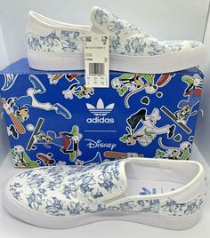 Adidas  Men's 3MC slip X Disney sport go "Goofy" sneakers Color: White & Blue Size: 11 Made in Vietnam NEW item in good condition Clean and smoke free store Please review all the picture Item sells as seen in the pictures Please contact us if you have questions #Ofcclst White Adidas Slip-on Low-top Sneakers, Adidas Casual Slip-on Sneakers For Streetwear, White Low-top Adidas Slip-on Sneakers, White Low-top Mickey Mouse Sneakers, Sporty Mickey Mouse Synthetic Sneakers, Adidas Casual Slip-on Sneakers With Round Toe, Mickey Mouse Sporty Sneakers For Streetwear, Sporty White Mickey Mouse Sneakers, White Sporty Mickey Mouse Sneakers