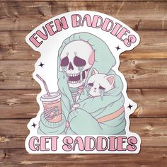 a sticker with an image of a skeleton holding a cat and the words even baddies get saddles