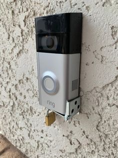 a camera mounted to the side of a wall