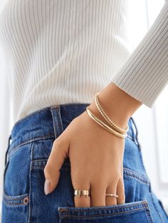 Our Arlo Cuff Set features two classic layers that are essentials in your collection. One style is simple gold while the other features a braided detail; both are adjustable. Wear together - or split apart - for graphic gold accents that pair well with any outfit. Trendy Stackable Gold Bangle, Trendy Gold Stackable Bangle, Adjustable Bangle For Everyday, Trendy Adjustable Gold-tone Cuff Bracelet, Gold Stackable Cuff Bracelet For Everyday, Trendy Gold-tone Cuff Bracelet Bangle, Trendy Gold-tone Cuff Bangle Bracelet, Trendy Adjustable Everyday Bangle, Adjustable Gold-tone Trendy Bracelets