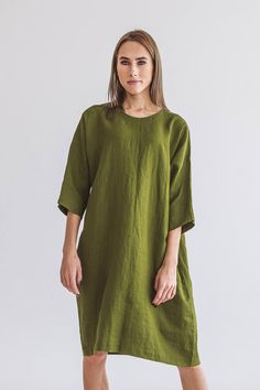 "DESCRIPTION: ♥ 100% natural European linen; ♥ safe Oeko-TEX® Standard 100 certified linen fabric ♥ softened midweight linen (185 g/m2) ♥ with 3/4 sleeves ♥ with pockets ♥ with belt ♥ oversize dress FIT ♥ length from the lower to the upper seam is about inches / cm ♥ measurements taken from a size S ♥ model is 173 cm and wearing a size S SIZE CHART: XS: Bust 30.7\"- 32.7\" (78-83 cm) , Waist 23.6\"- 25.6\" (60-65 cm), Hips 33.5\"- 35\" (85-89 cm) S: Bust 33\"- 35\" (84-89 cm) , Waist 26\"- 28\" Oversized 3/4 Sleeve Summer Dress, Summer Tunic With 3/4 Sleeves And Relaxed Fit, Green Relaxed Fit Linen Dress With Pockets, Green Relaxed Fit Linen Dress, Half Sleeve Linen Dress For Summer, Linen Dresses With Rolled Sleeves In Relaxed Fit, Daywear Linen Dress With 3/4 Sleeves, Linen Dress With 3/4 Sleeves For Daywear, Summer Linen Dress With 3/4 Sleeves