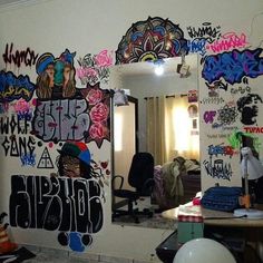 a room with graffiti all over the walls