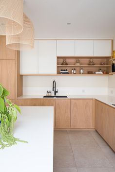 the kitchen is clean and ready for us to use it's natural wood accents