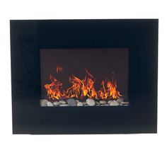 a fire burning in a black fireplace with rocks on the bottom and flames coming out